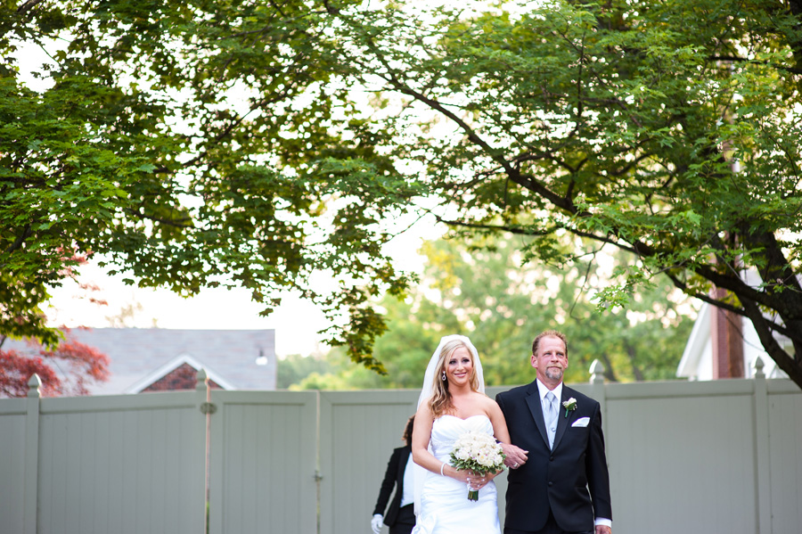 baltimore wedding photographer, white rose bouquet with hot pink pearl details, high heels, drop hoop diamond earrings, father walking bride down the aisle, martin's west