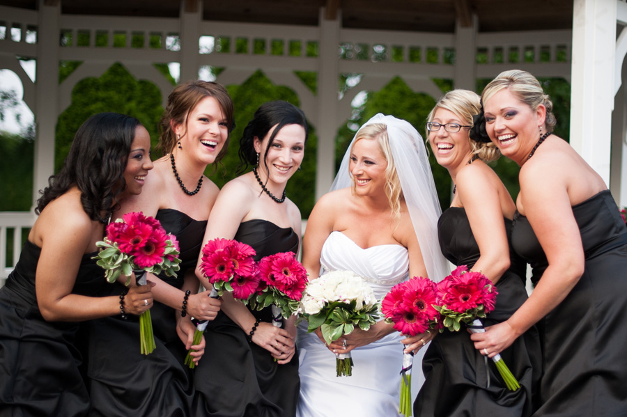 baltimore wedding photographer, hot pick bridesmaid bouquets, bridesmaids laughing, gerber daisy bouquets, black and hot pink bridal party colors